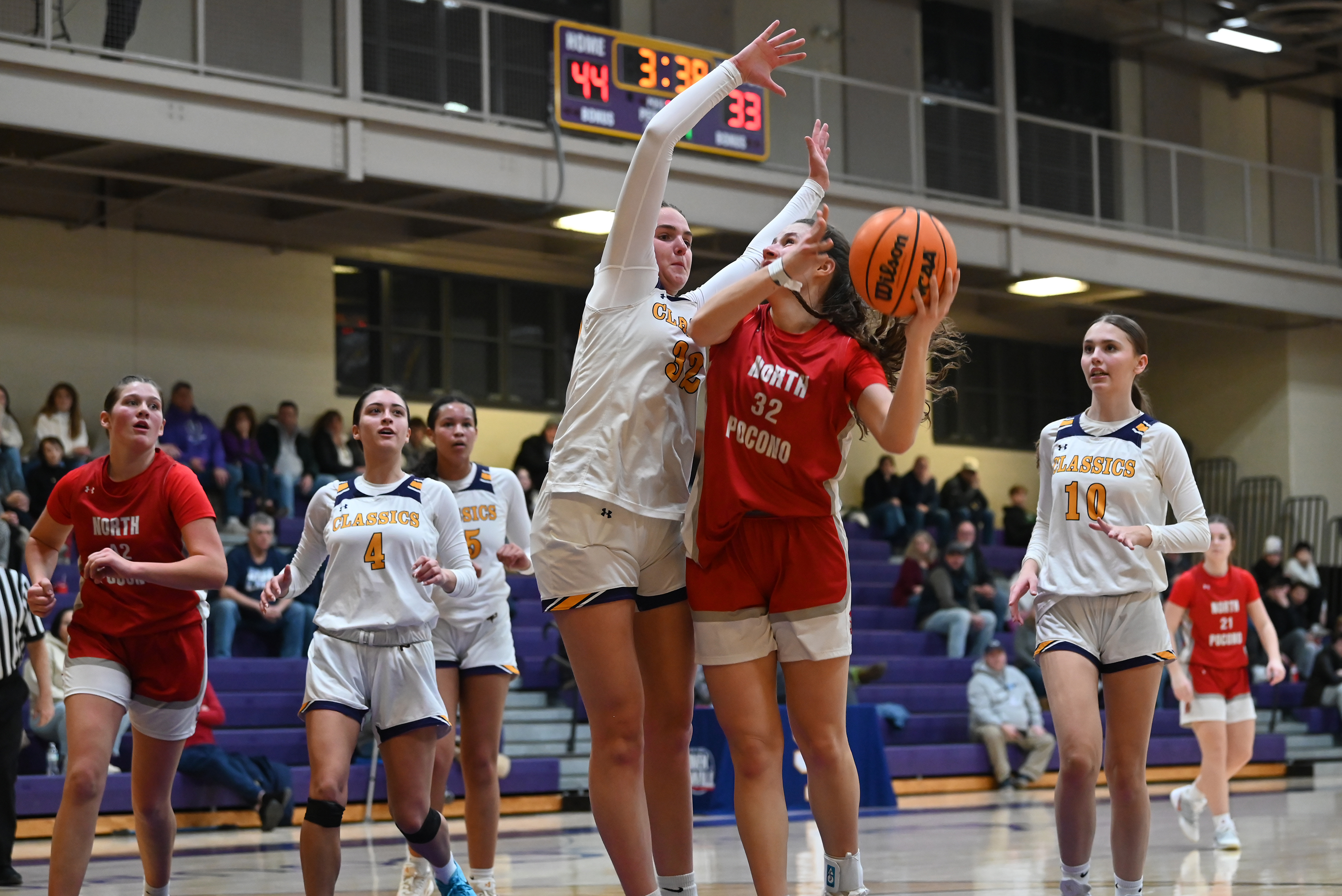 Scranton Prep’s Chloe Mamera defends North Pocono’s Celia DeCesare during...