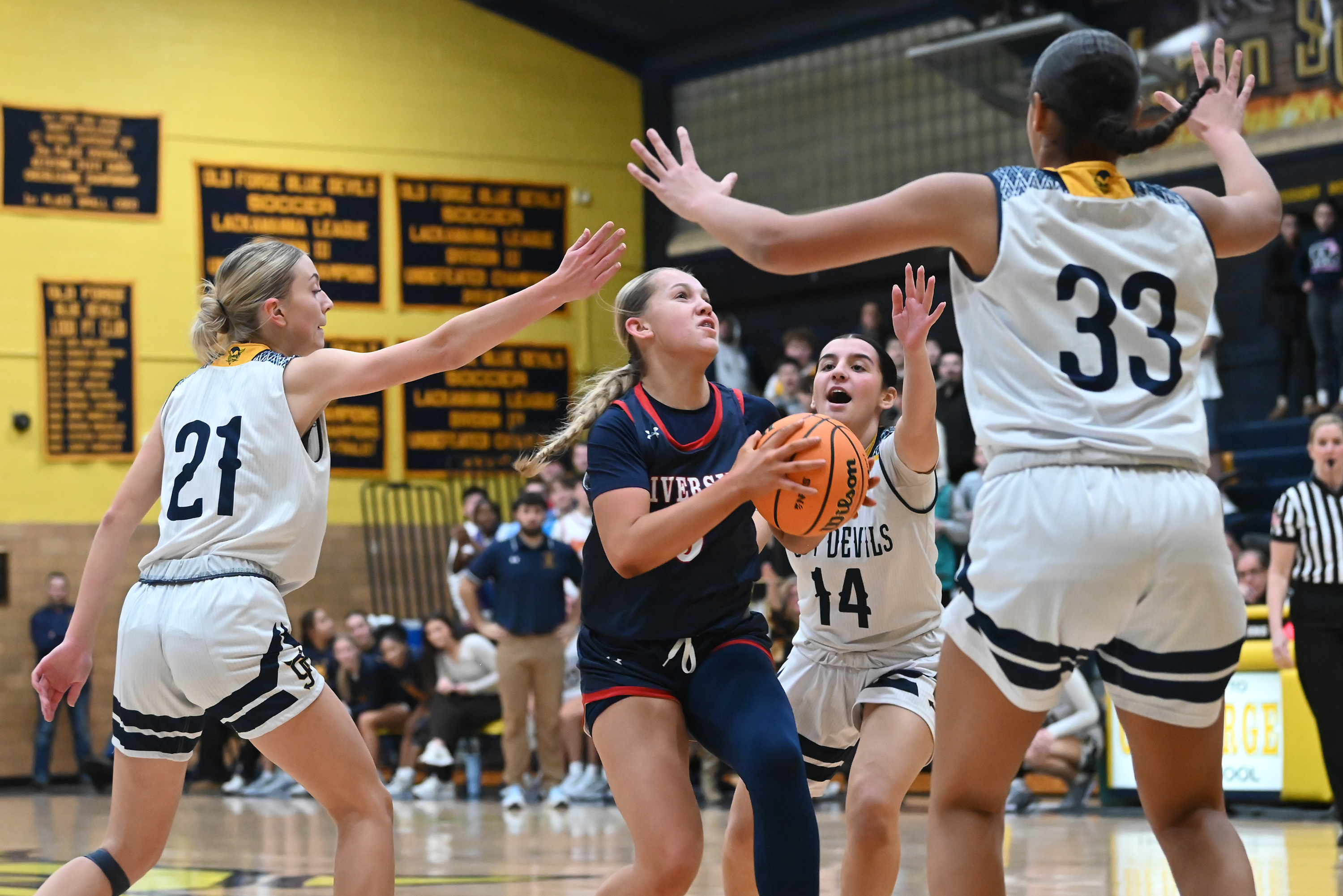 Riverside’s Faith Pavalonis lines up with the hoop during the...