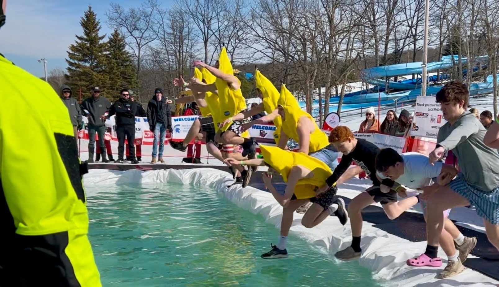 Students from Western Wayne High School take the plunge Thursday...