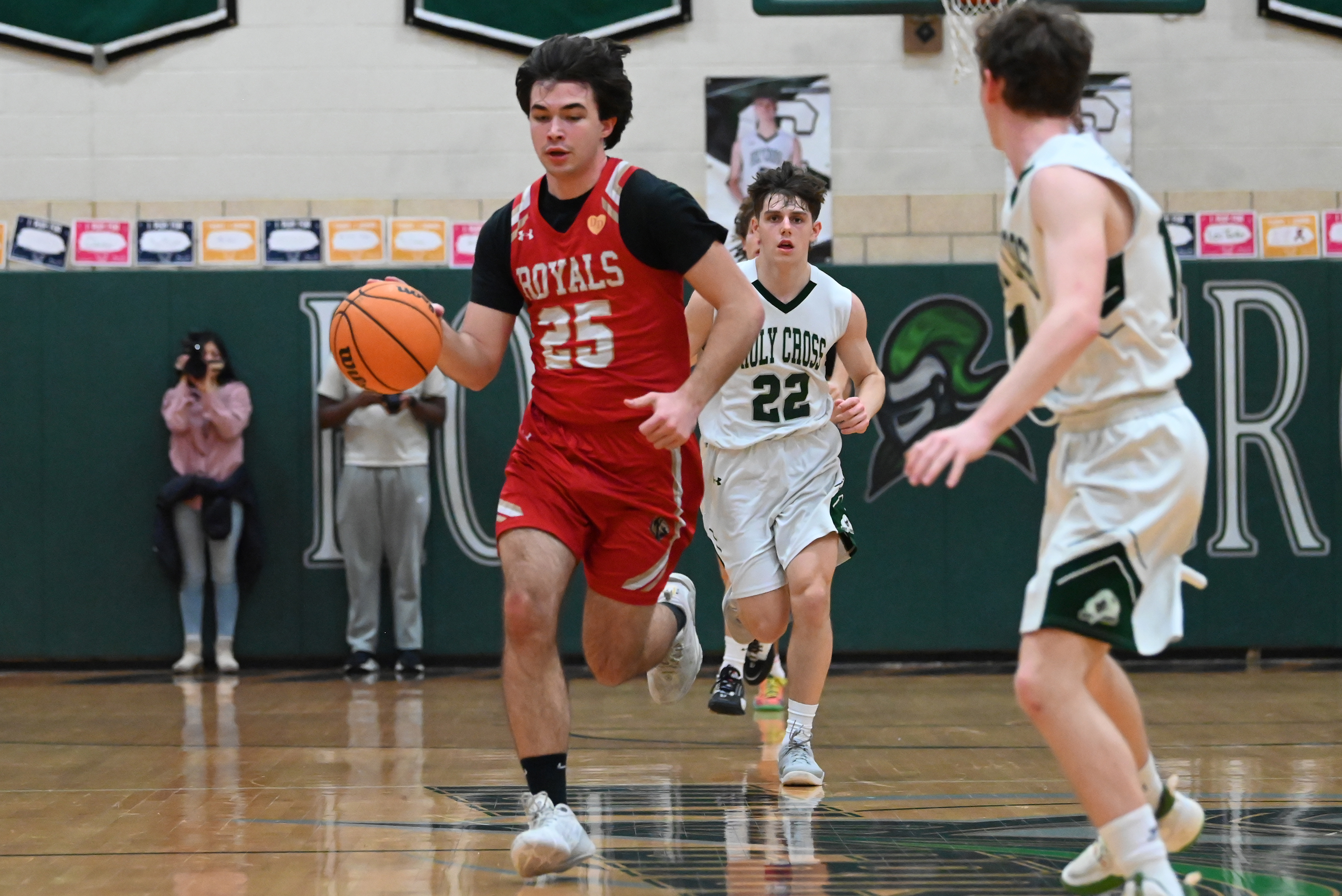 Holy Redeemer’s Kaden Sepkosk moves the ball during the basketball...