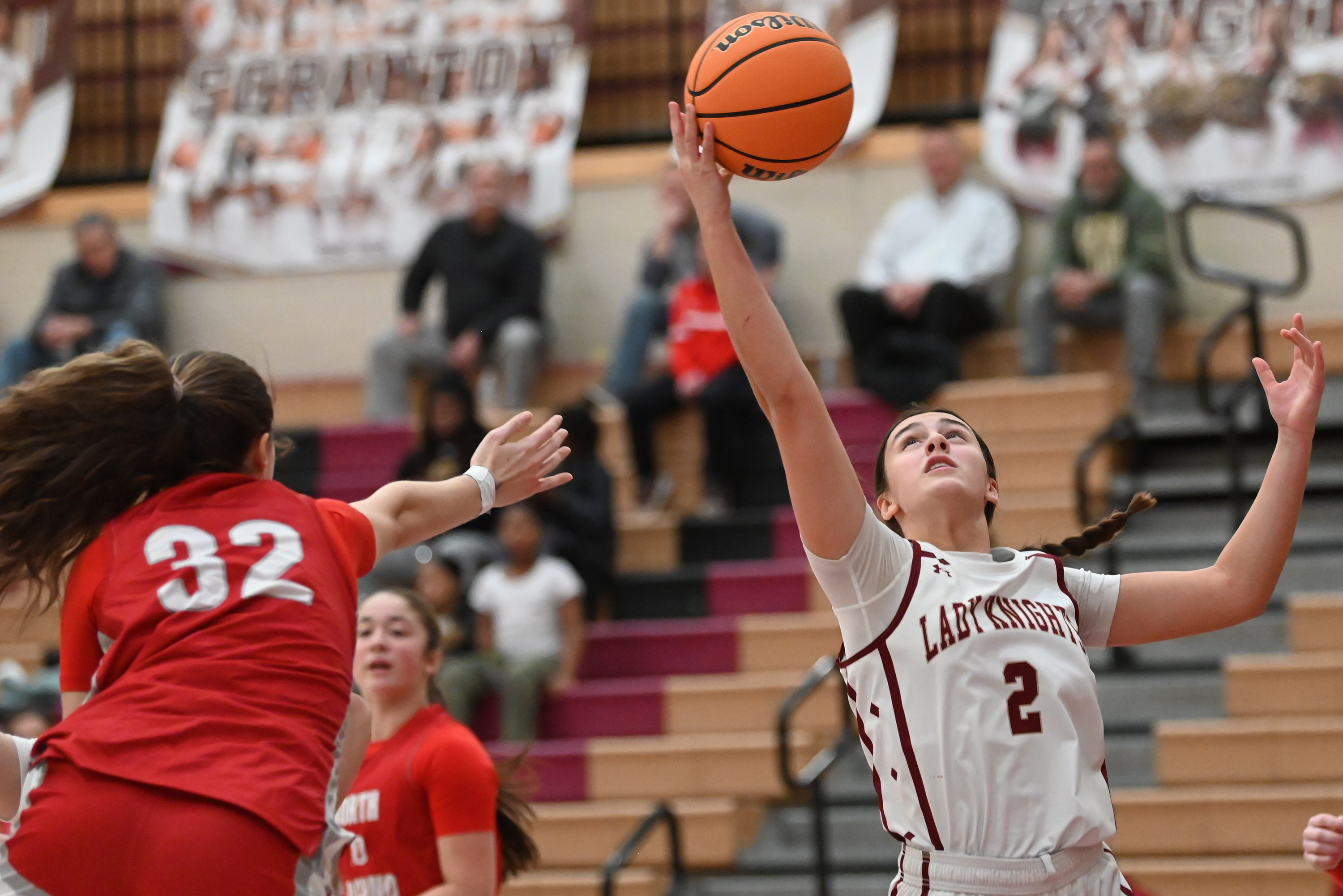 Scranton’s Chrissy Jacklinski grabs a rebound during the basketball game...