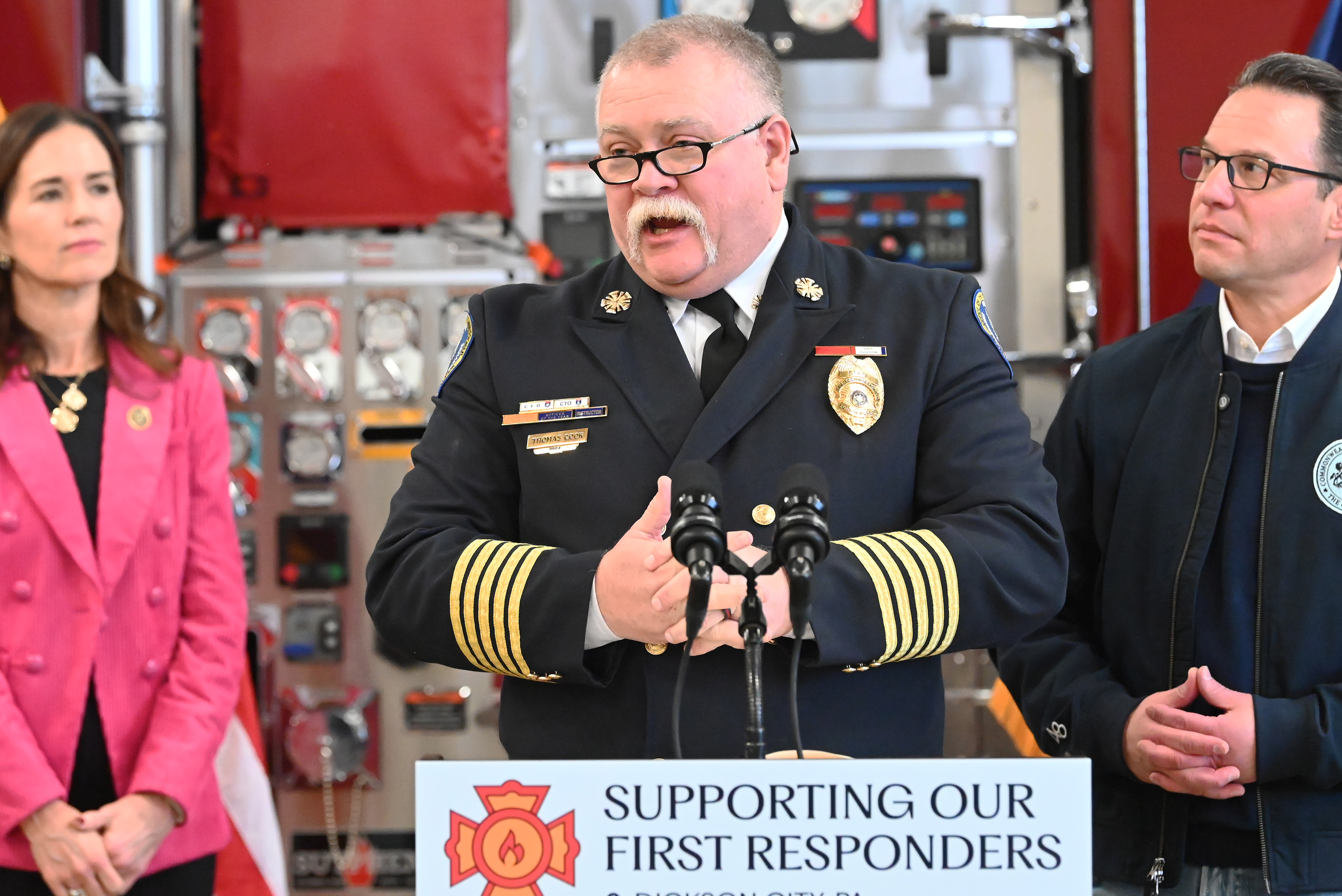 Pennsylvania State Fire Commissioner Thomas Cook speaks during the press...
