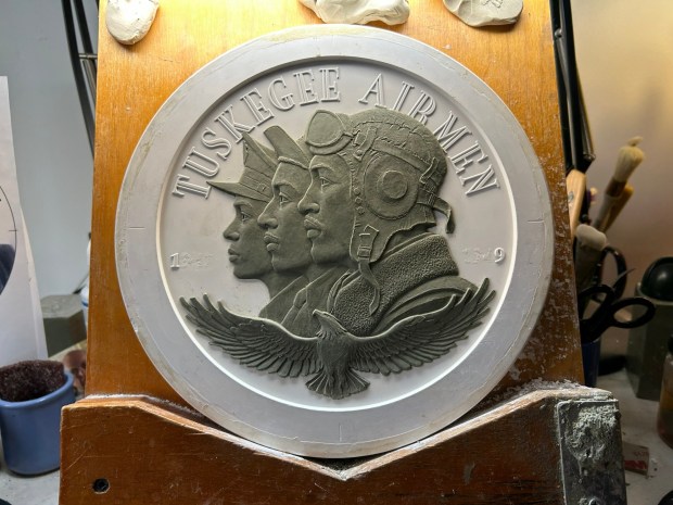 The design for the Tuskegee Airmen Congressional Gold Medal, sculpted in clay and plaster by U.S. Mint medallic artist Phebe Hemphill. (Asha Prihar / Spotlight PA)