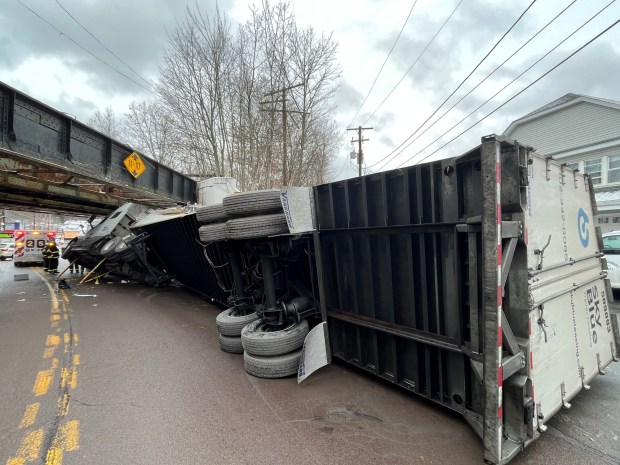 A tractor-trailer crashed into a railroad bridge on Constitution Avenue in Jessup Monday morning. (ROBERT TOMKAVAGE/STAFF PHOTO)