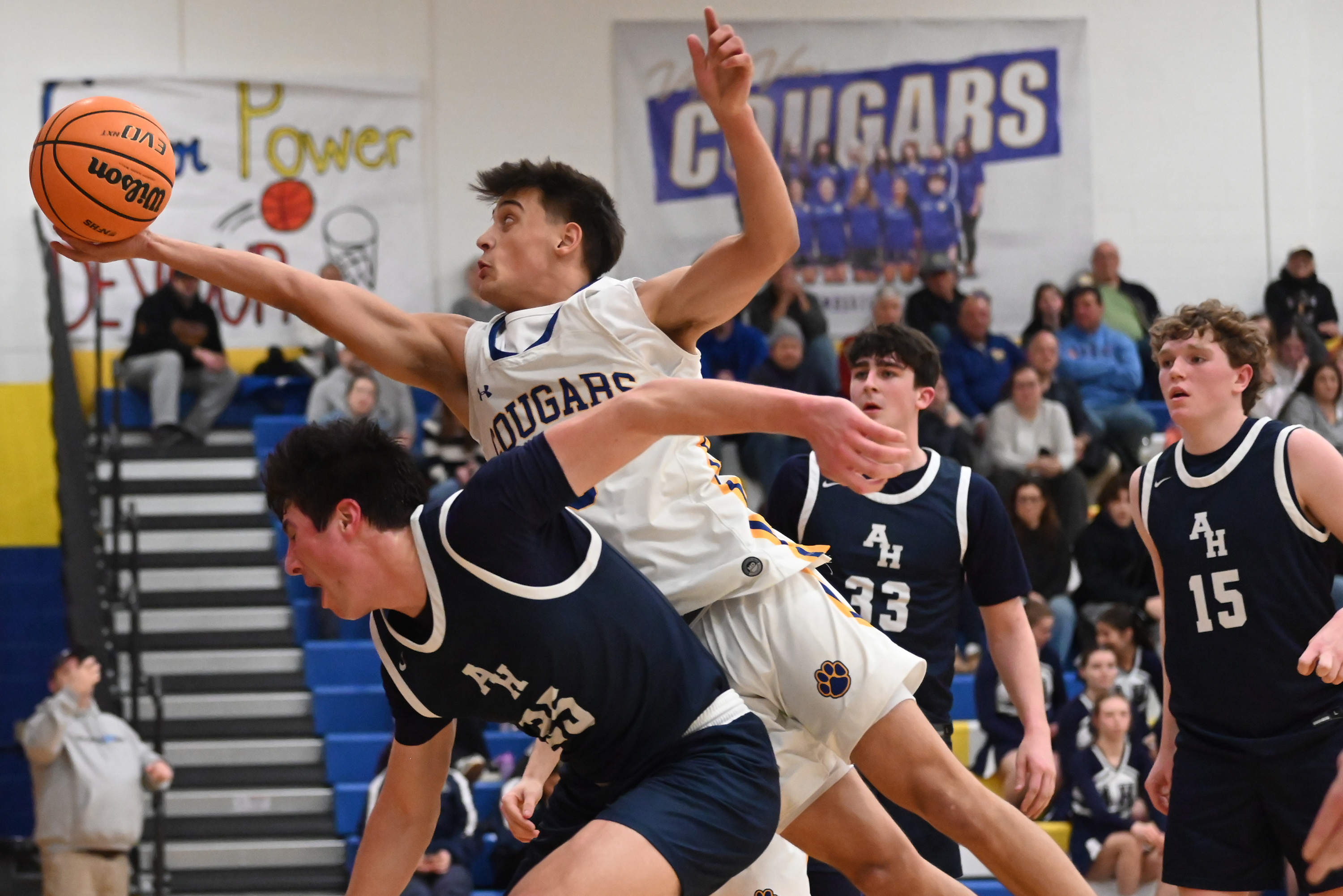 Valley View’s Michael Muto jumps over Abington Heights’ Finn Goldberg...