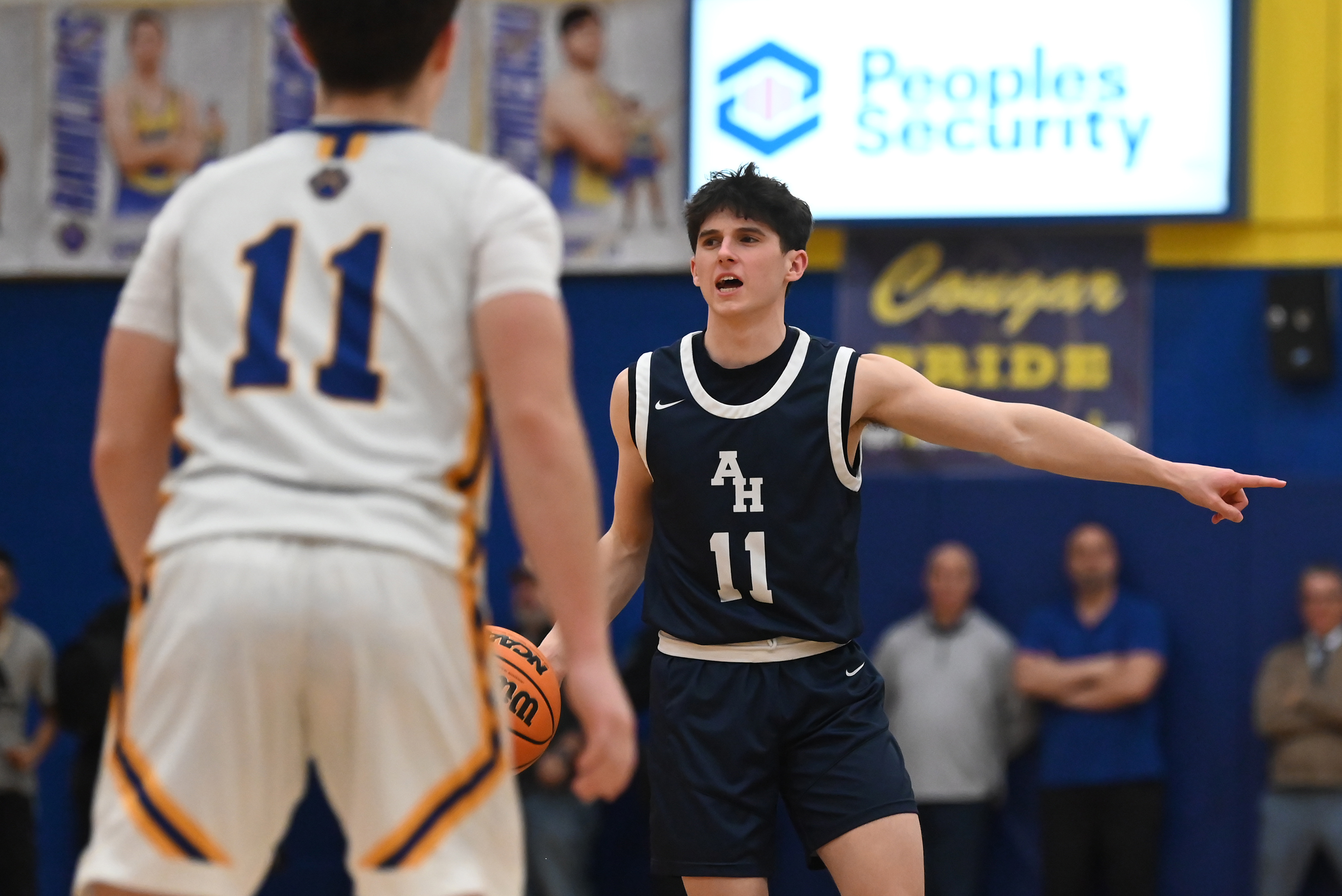 Abington Heights’ Chris Begley calls out to his teammates during...