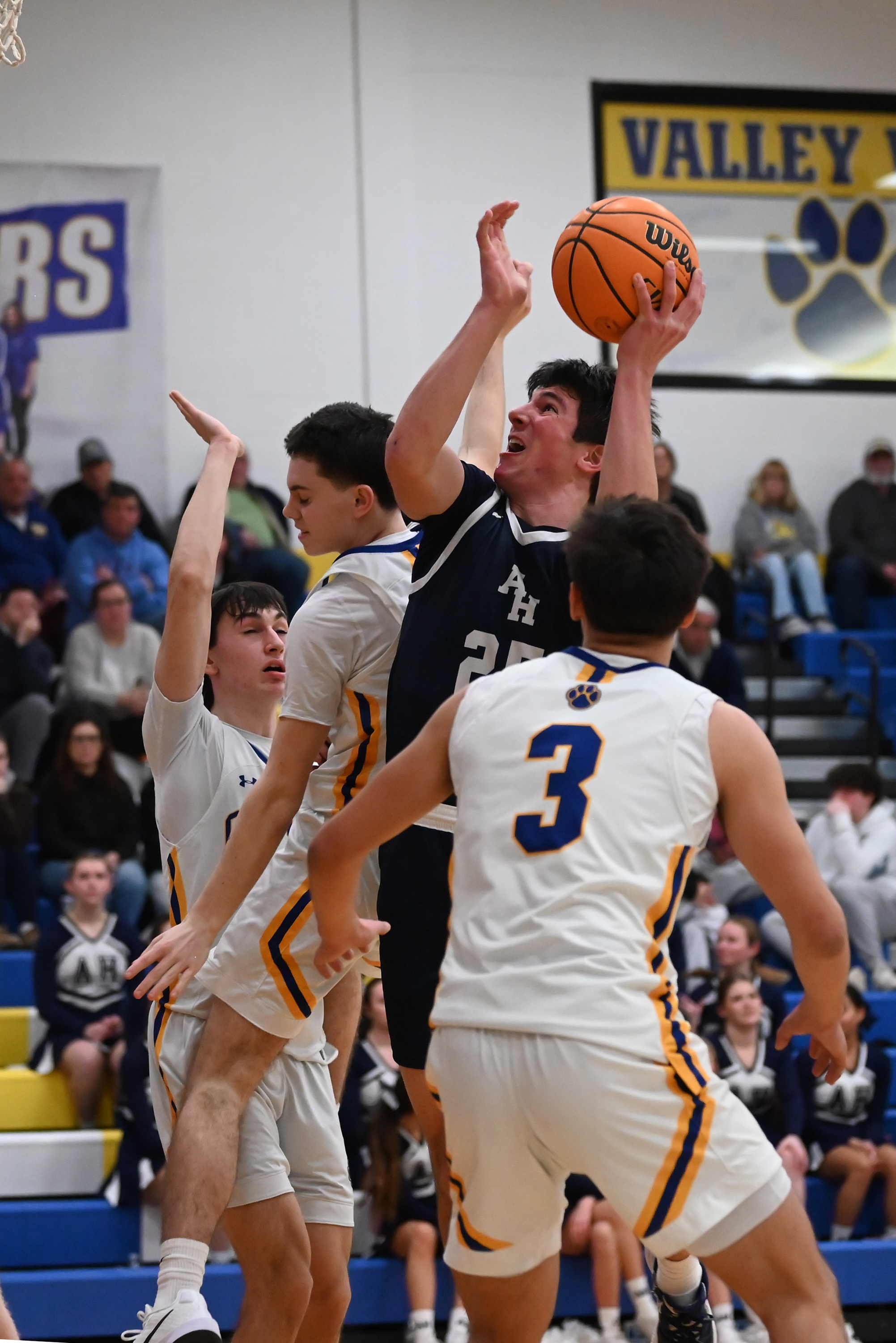 Abington Heights’ Finn Goldberg takes a shot during the basketball...
