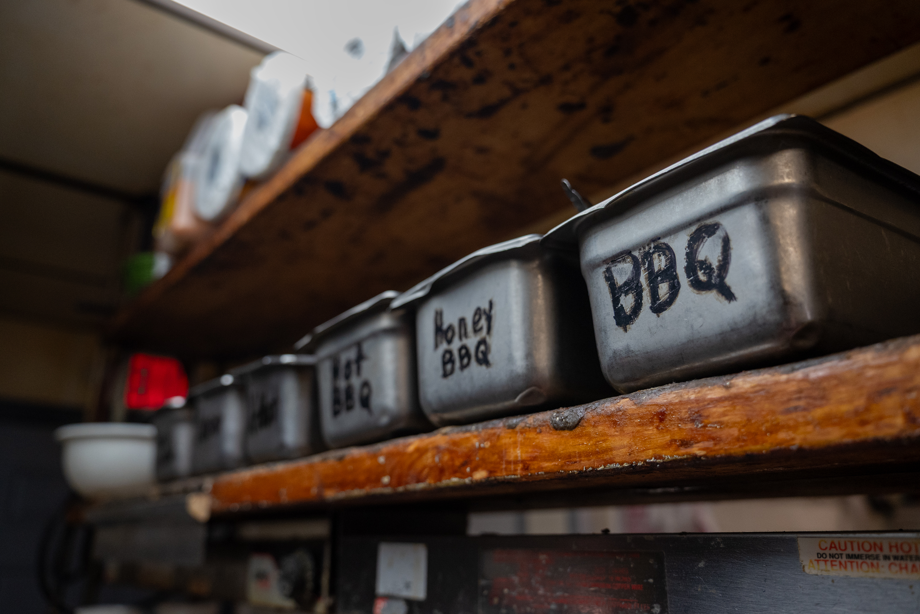 Sauce bins at Kelly’s Pub and Eatery on Cedar Ave....