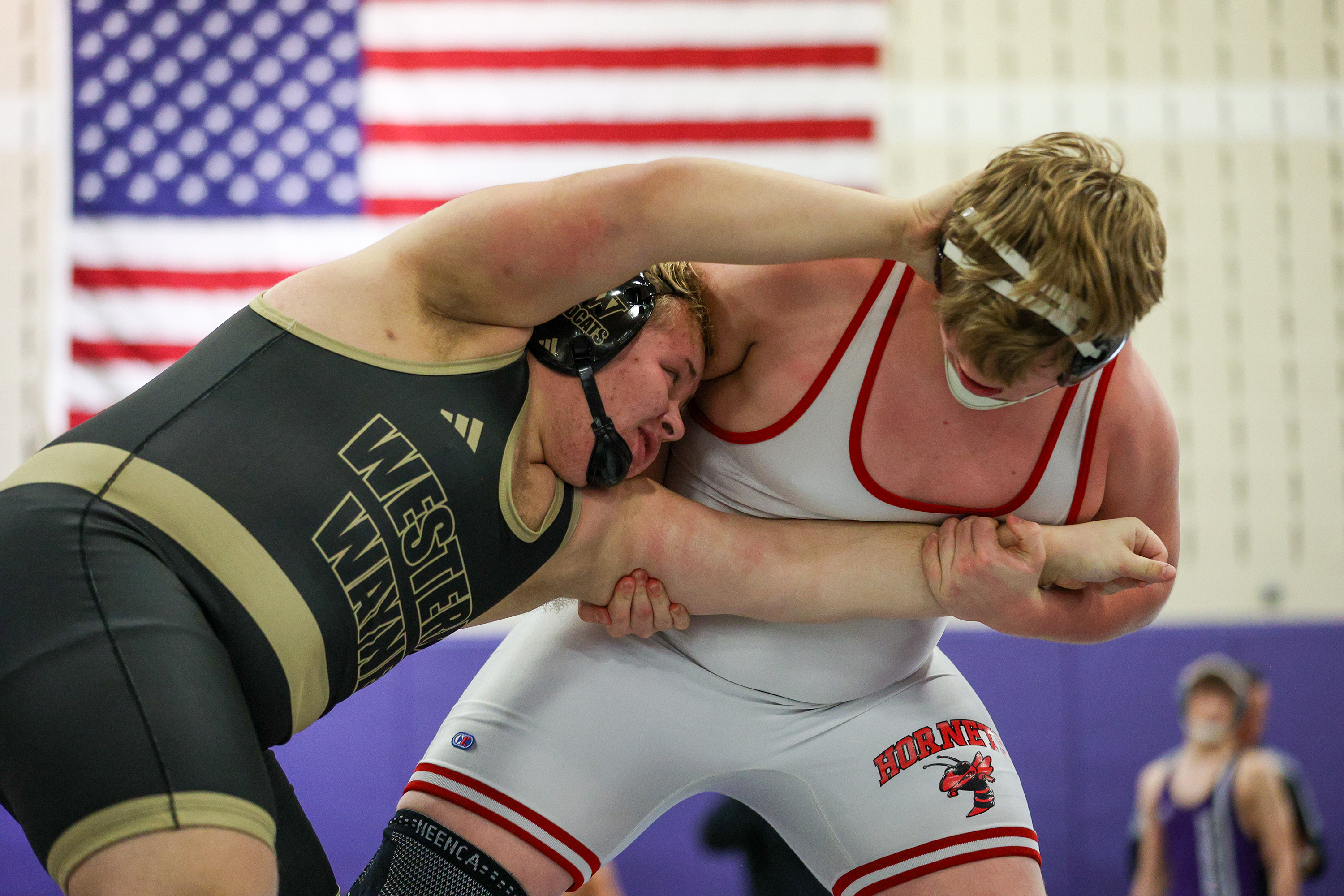 Honesdale’s Bobby MacDowell, right, and Western Wayne’s Paul Borowski wrestle...