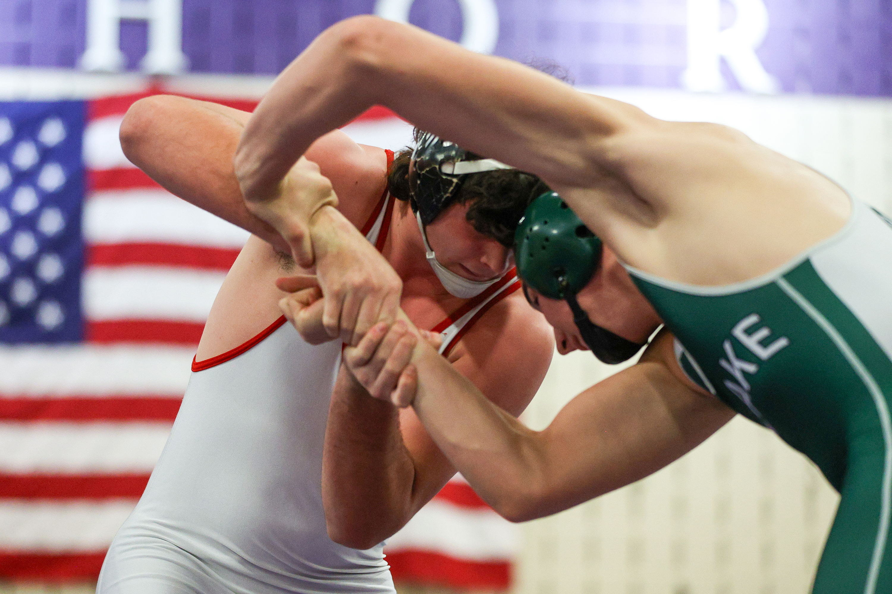 Honesdale’s Levi Landry, left, wrestles Elk Lake’s Colby Ruark on...