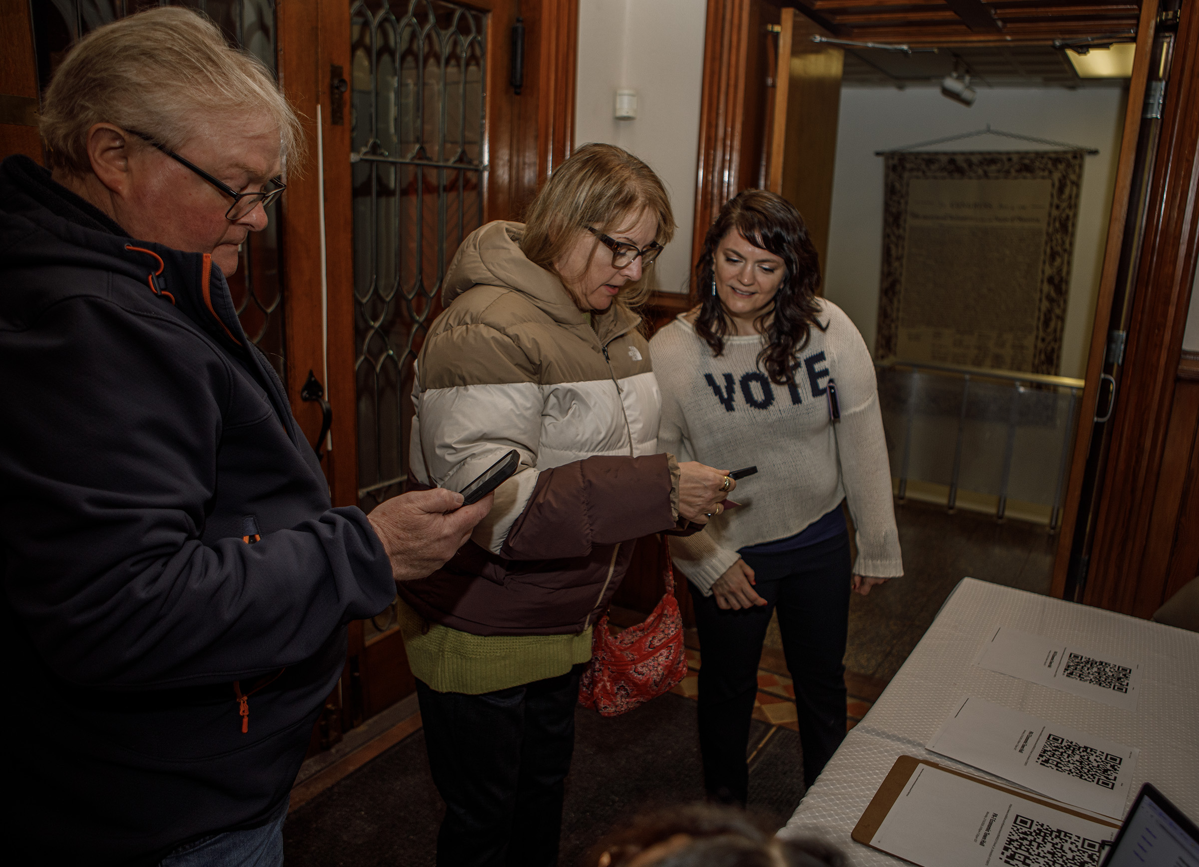 Cheryl Lutz, far right, of PA 7 United, helps Andrew...