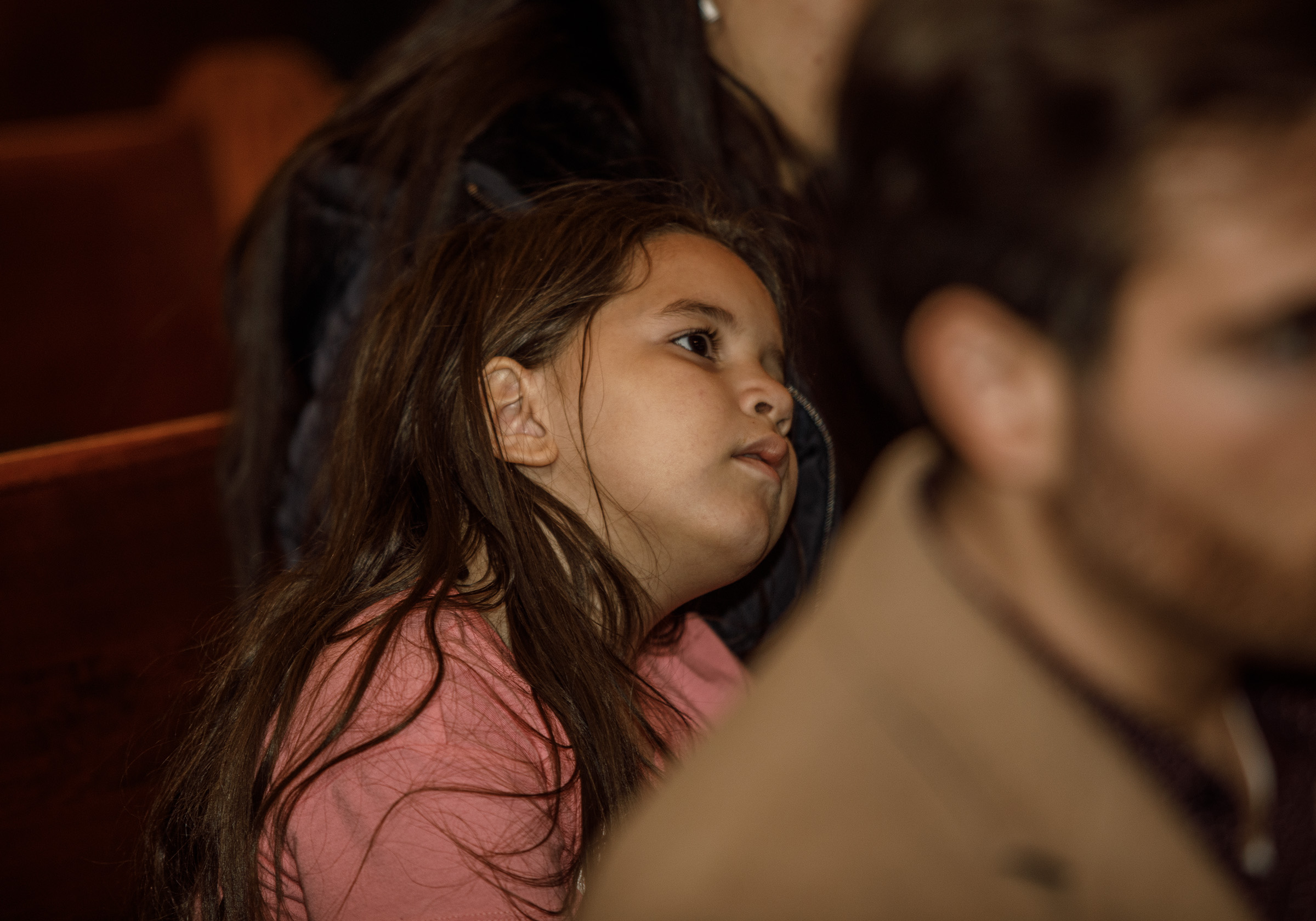 Jendaliz Diaz-Espinal, 7, of Allentown listens during a forum to...