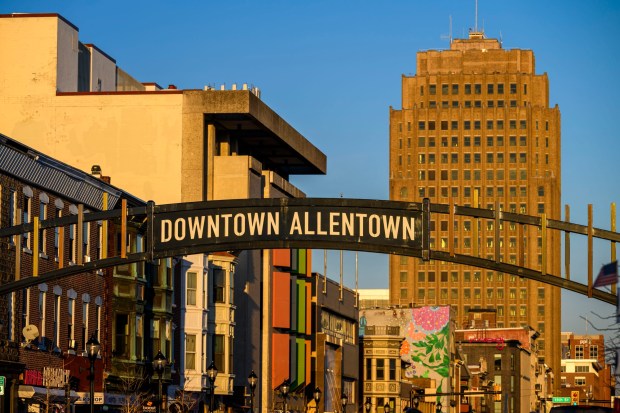 A new gateway arch rises above the 1100 block of Hamilton Street on Thursday, Feb. 5, 2026, in Allentown. The arch, part of efforts to spruce up the downtown area, is a little more than 19 feet high. The arch greets those heading eastbound into the downtown with a sign that reads, "Downtown Allentown"; while the other side reads, "West Park." (April Gamiz/The Morning Call)