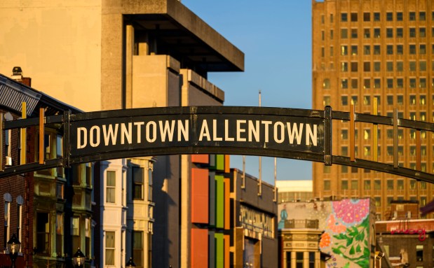 A new gateway arch rises above the 1100 block of Hamilton Street on Thursday, Feb. 5, 2026, in Allentown. The arch, part of efforts to spruce up the downtown area, is a little more than 19 feet high. The arch greets those heading eastbound into the downtown with a sign that reads, "Downtown Allentown"; while the other side reads, "West Park." (April Gamiz/The Morning Call)
