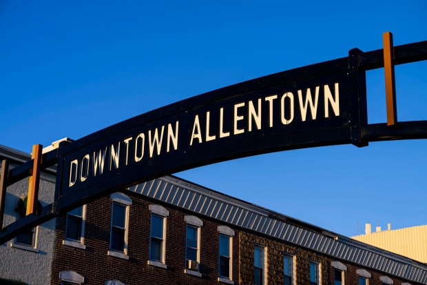 A new gateway arch rises above the 1100 block of Hamilton Street on Thursday, Feb. 5, 2026, in Allentown. The arch, part of efforts to spruce up the downtown area, is a little more than 19 feet high. The arch greets those heading eastbound into the downtown with a sign that reads, "Downtown Allentown"; while the other side reads, "West Park." (April Gamiz/The Morning Call)
