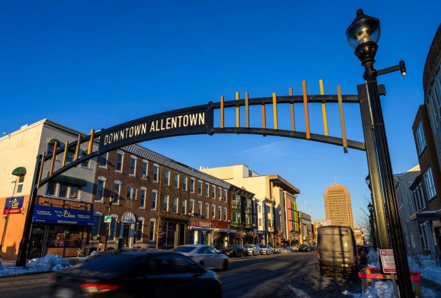 A new gateway arch rises above the 1100 block of Hamilton Street on Thursday, Feb. 5, 2026, in Allentown. The arch, part of efforts to spruce up the downtown area, is a little more than 19 feet high. The arch greets those heading eastbound into the downtown with a sign that reads, "Downtown Allentown"; while the other side reads, "West Park." (April Gamiz/The Morning Call)