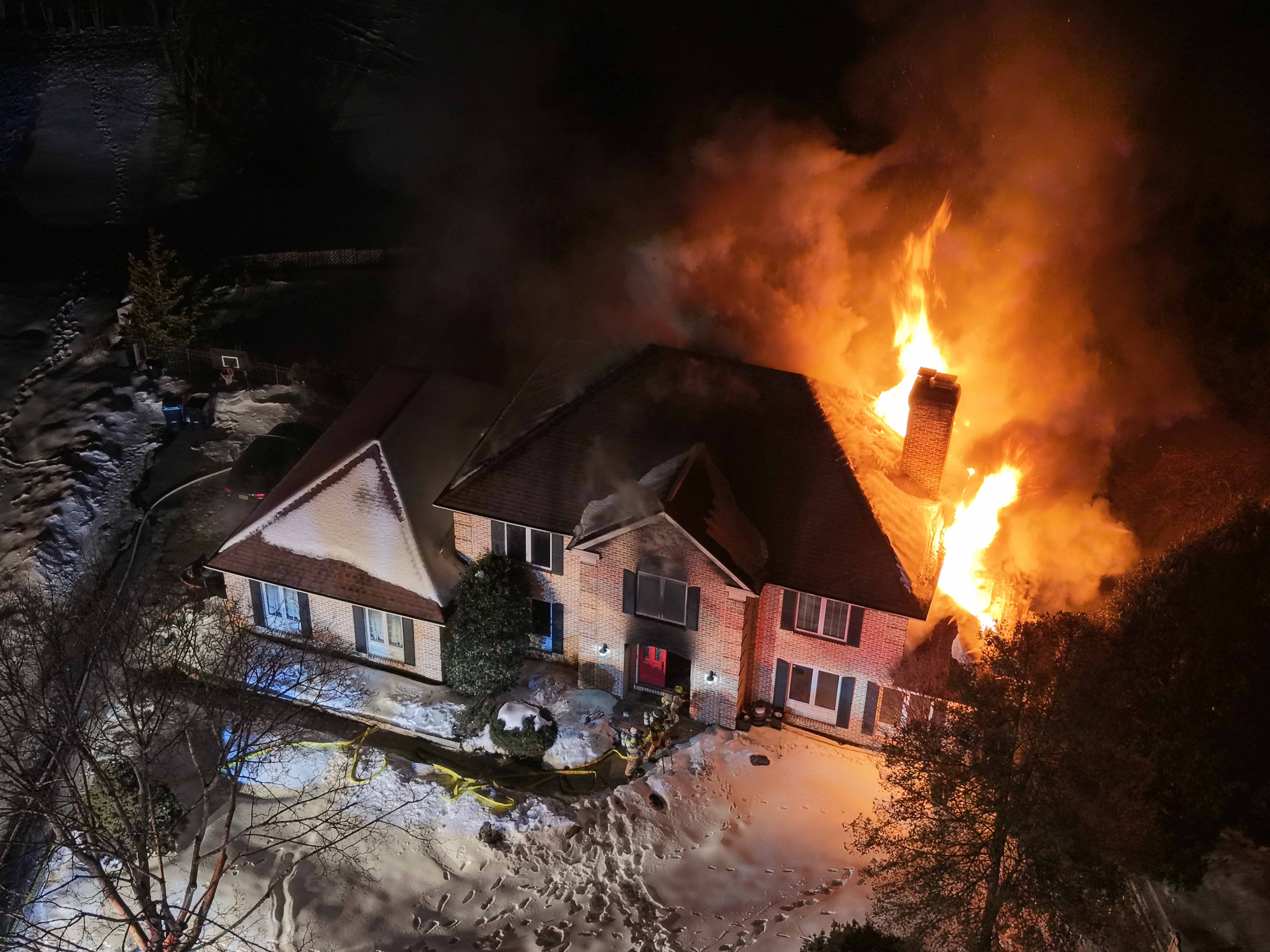 Fire fighters battle a blaze Sunday, Feb.8, 2026 during very...