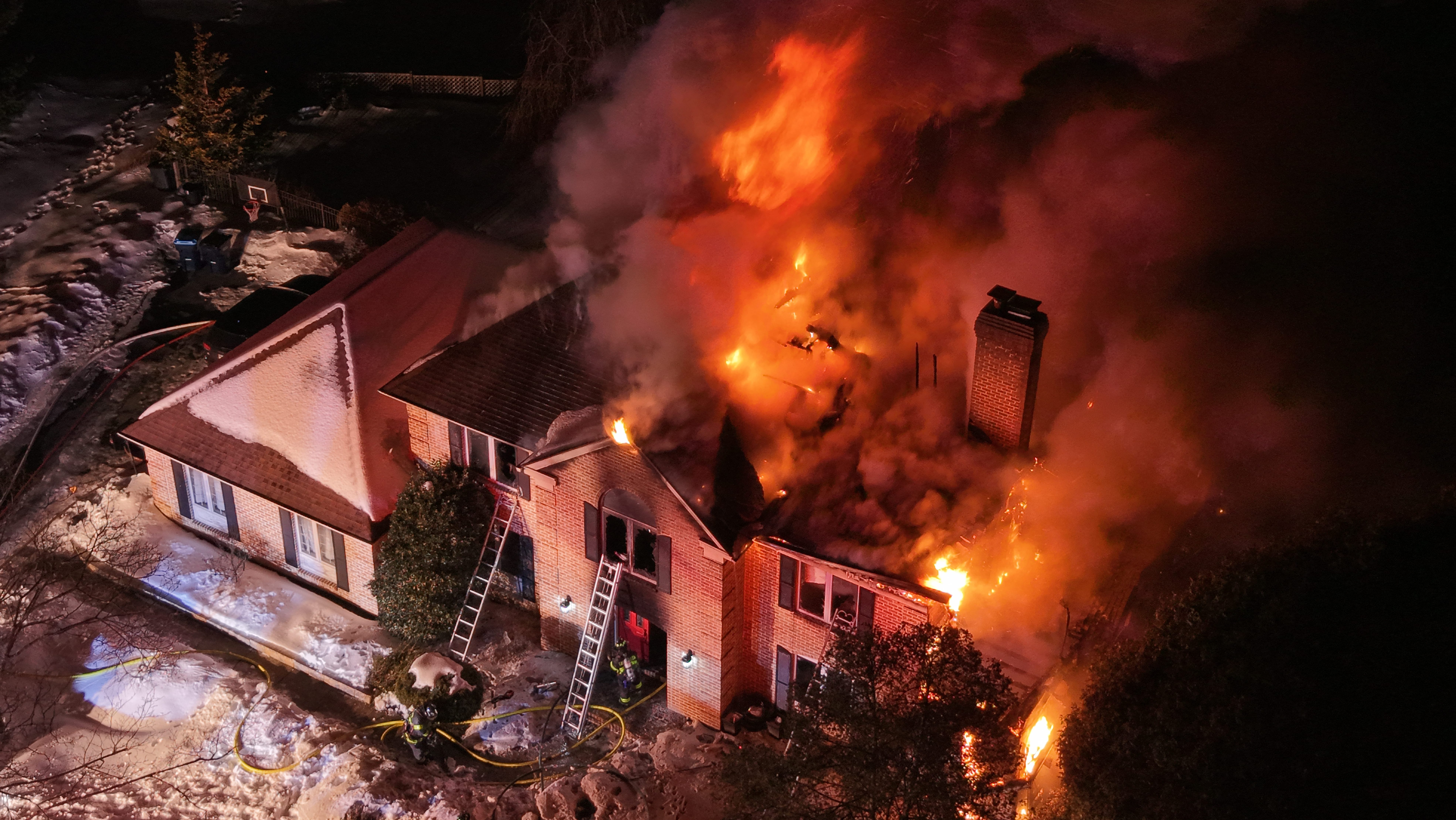 Fire fighters battle a blaze Sunday, Feb.8, 2026 during very...
