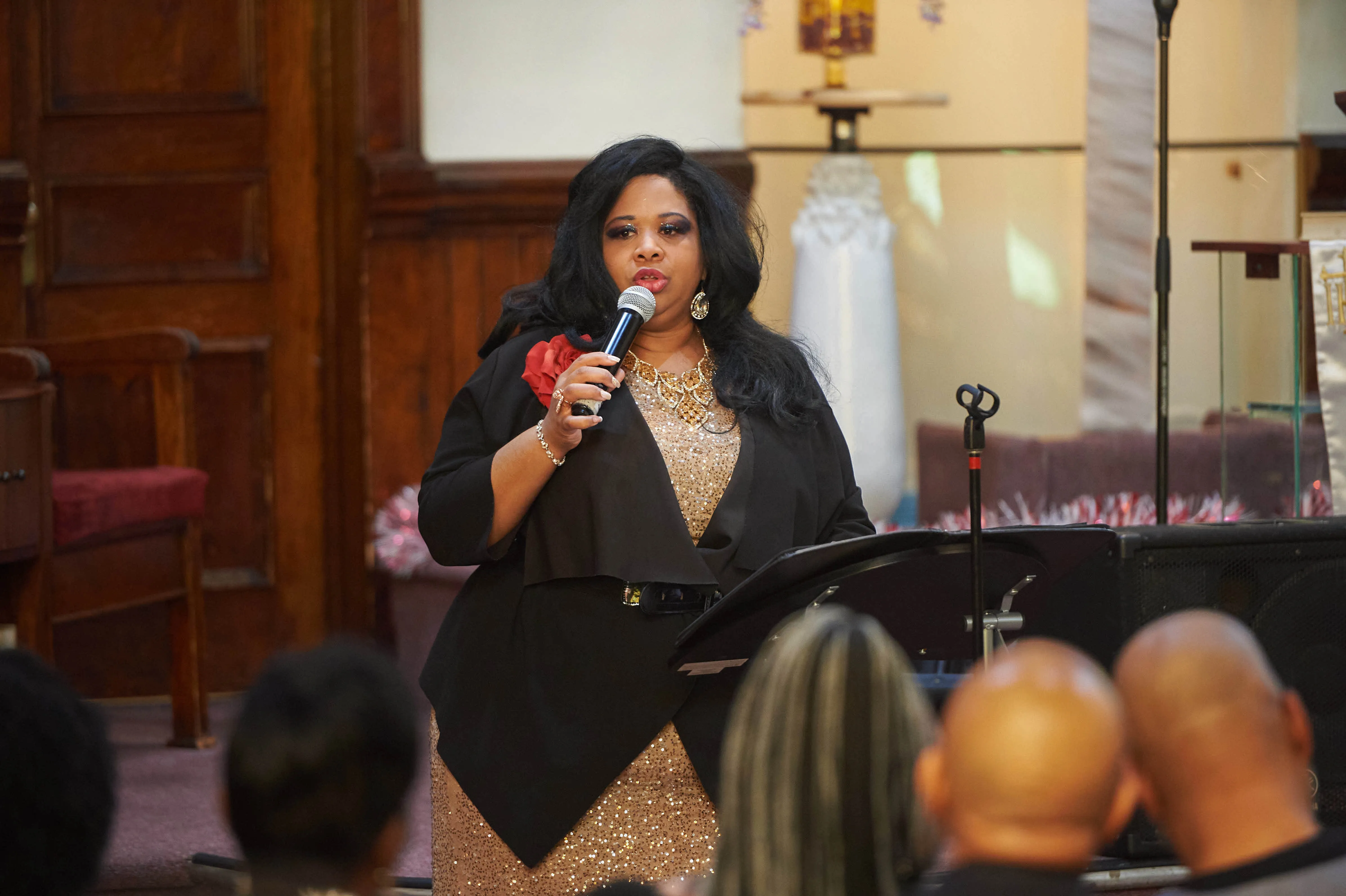 Kari Holmes, a pastor with City of Hope Church, speaks...