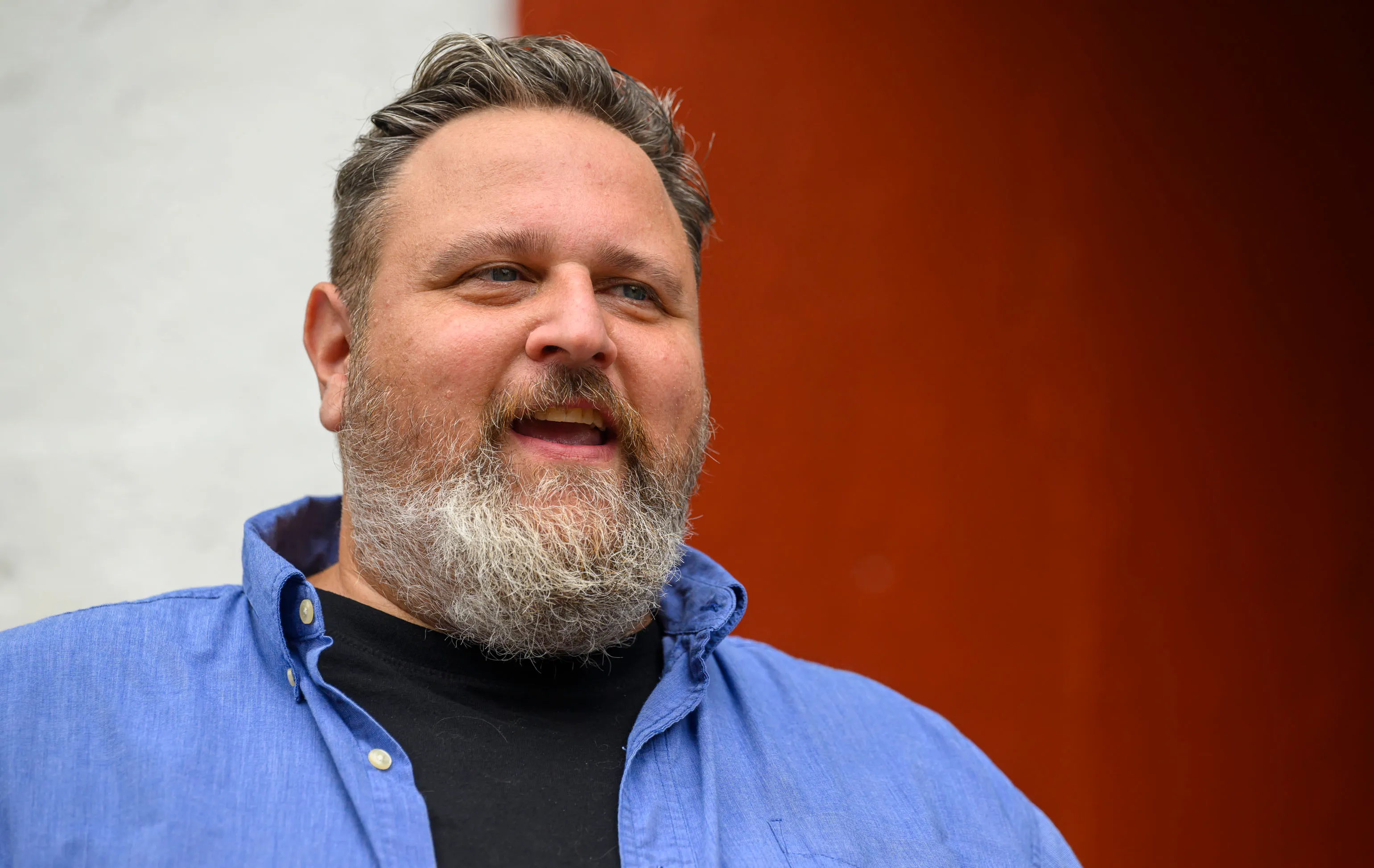 Matt Halm speaks Saturday, Sept. 6, 2025, about the mural...