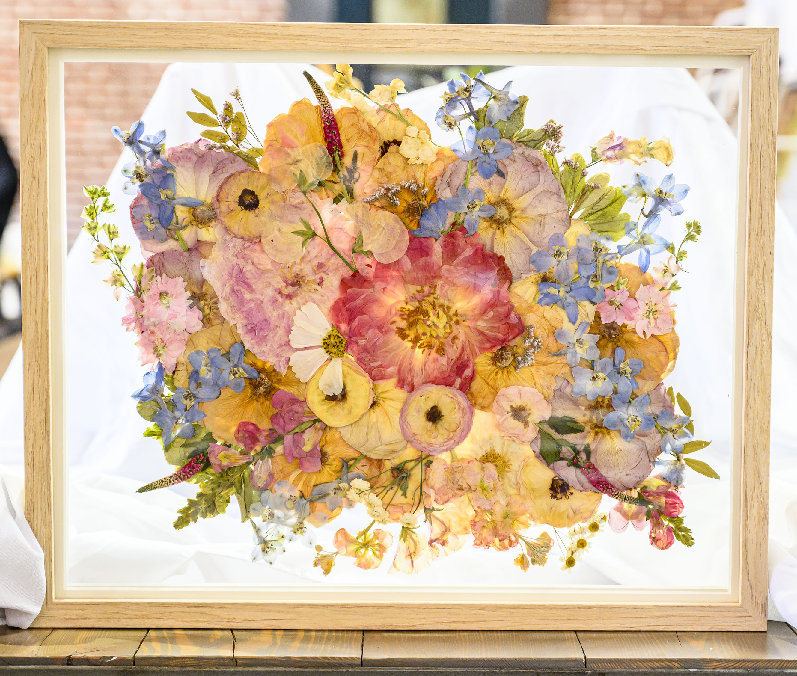 Pressed flower frames are displayed Friday, Feb. 13, 2026, at...