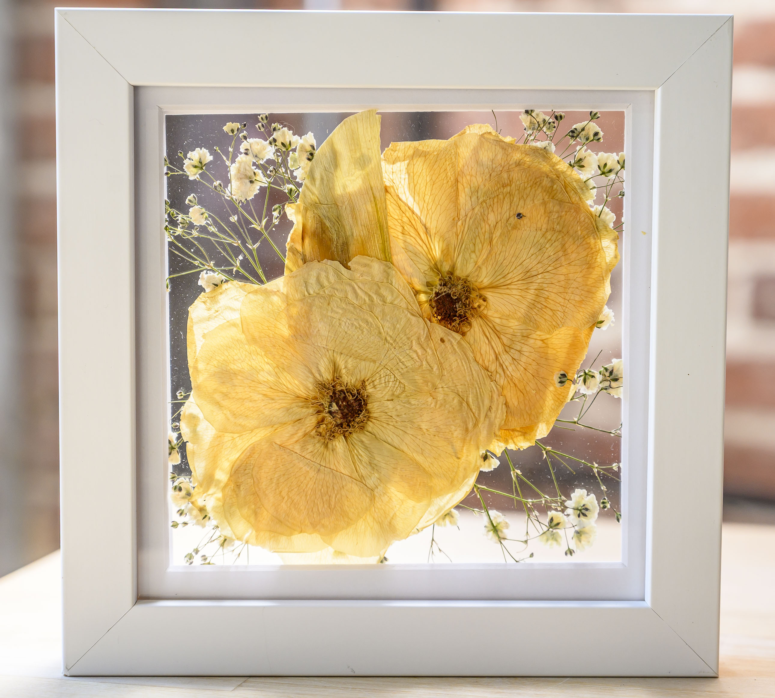 Pressed flower frame is displayed Friday, Feb. 13, 2026, at...