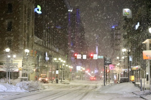 Snow falls Sunday, Feb. 22, 2026, late in the evening in Allentown. A winter storm was expected to drop 7-14 inches of snow in the region Sunday into Monday, though the National Weather Service said there was uncertainty about the total. (Rich Rolen/Special to The Morning Call)