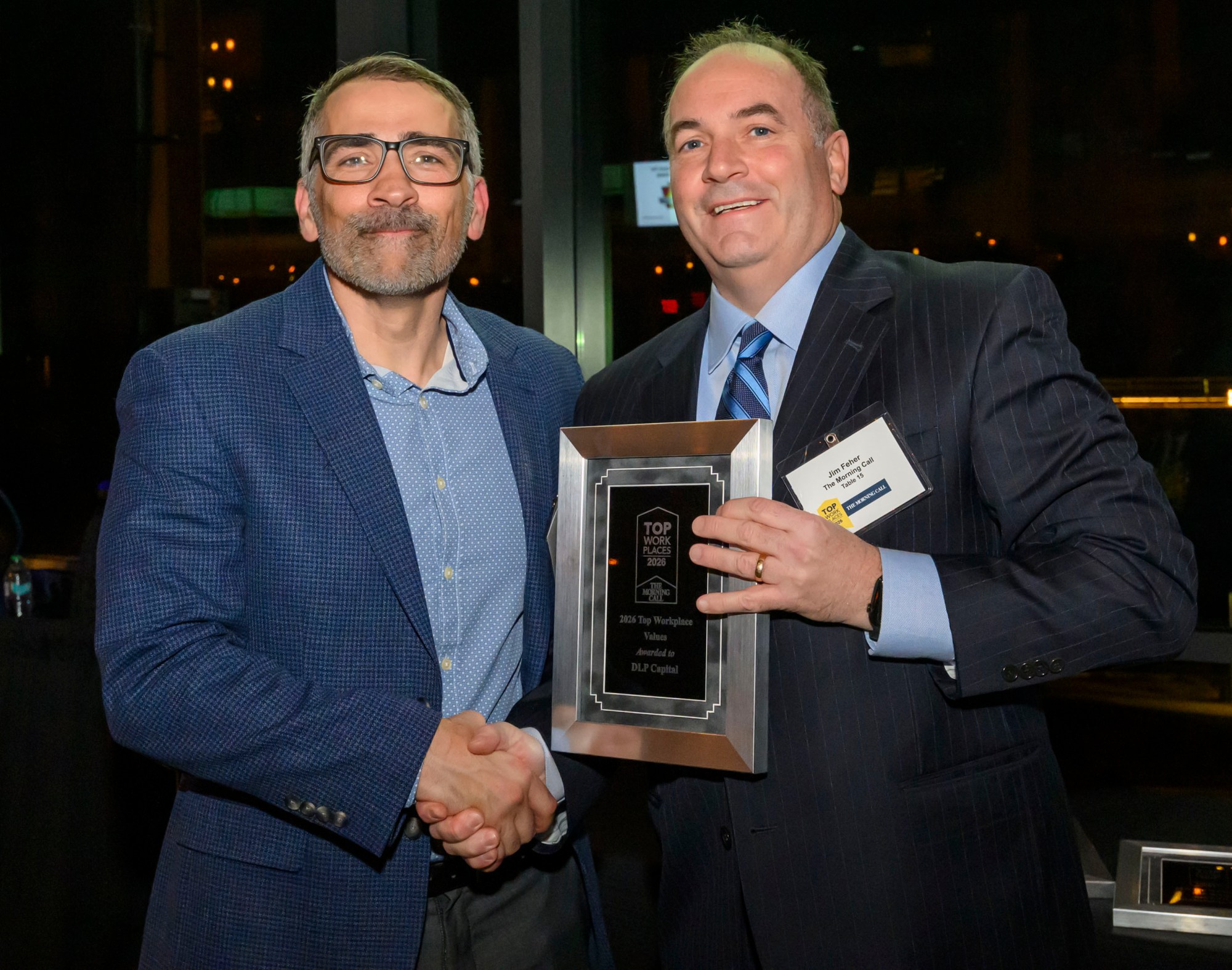 DLP wins the Top Workplace Special Award for Values category presented by The Morning Call's Jim Feher, Vice President of Advertising during The Morning Call's Lehigh Valley Top Workplaces Awards 2026 awards banquet Thursday, Feb. 26, 2026, at the ArtsQuest Center at SteelStacks in Bethlehem.(April Gamiz/The Morning Call)