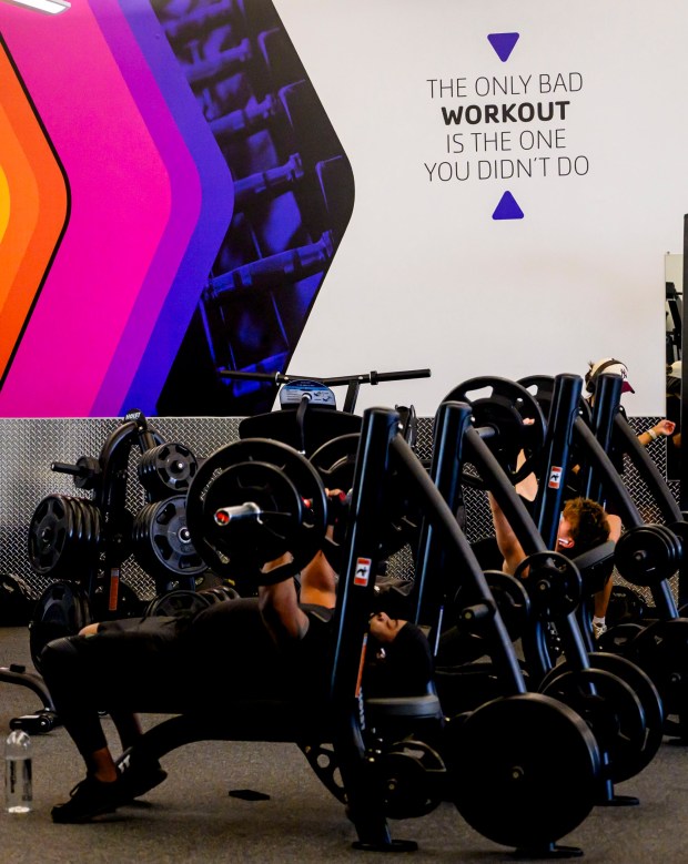 People lift weights Tuesday, Feb. 24, 2026, at YMCA of Easton in Easton. River Crossing YMCA is holding "Try the Y" for free Feb. 23 - March 1, 2026, at its branches in Lehigh, Northampton, Bucks and Hunterdon counties; new members can sign up without needing to pay a join fee through March 8. (April Gamiz/The Morning Call)