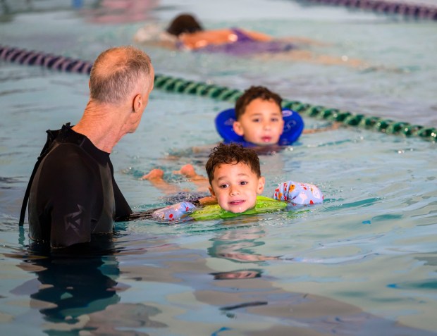 Peter Willeford of Forks Township swims with his grandchildren, Micah, 3, and Myles, 5, on Tuesday, Feb. 24, 2026, at YMCA of Easton in Easton. River Crossing YMCA is holding "Try the Y" for free Feb. 23 - March 1, 2026, at its branches in Lehigh, Northampton, Bucks and Hunterdon counties; new members can sign up without needing to pay a join fee through March 8. (April Gamiz/The Morning Call)