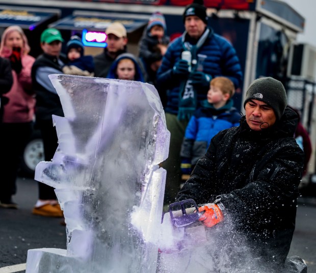 Ice God mater carver Angelito Baban carves ice sculptures Saturday, Feb. 8, 2025, during Winterfest at Grange Park in Upper Macungie Township. (April Gamiz/The Morning Call)