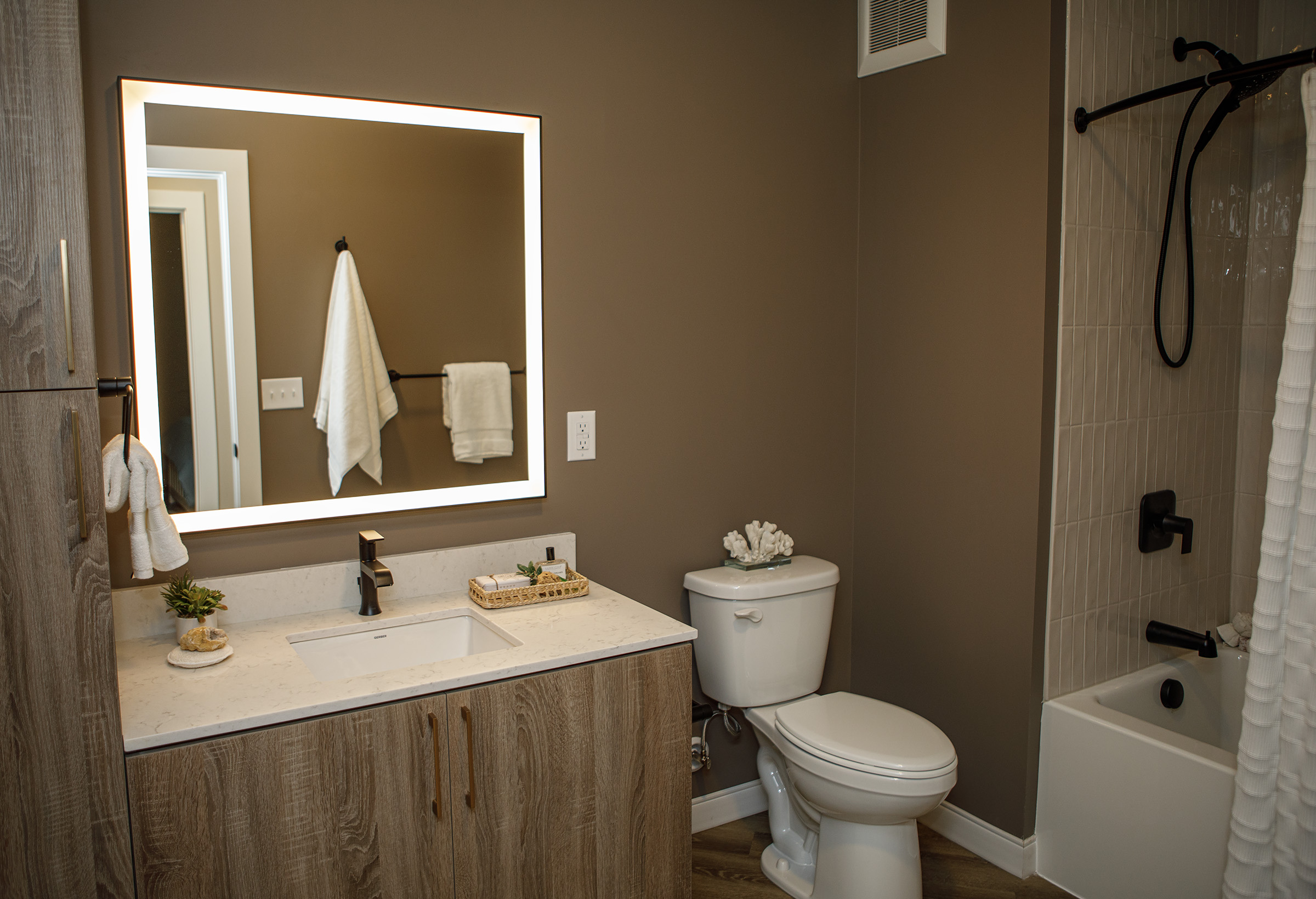 The bathroom in an one bedroom apartment in the Confluence,...