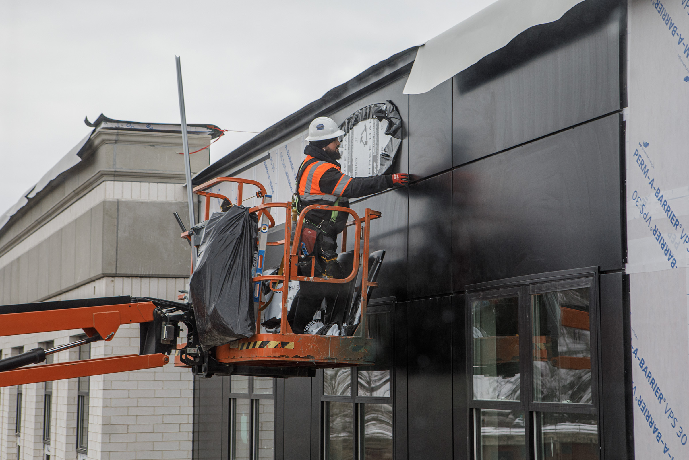 A construction worker at the Confluence, City Center’s newest apartment...
