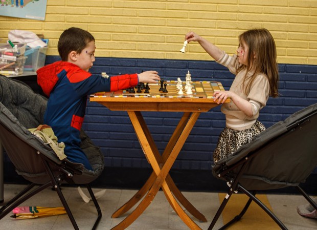 Raz Saltz, 5, of South Whitehall Township and Talia Kurtz, 4, of Allentown play chess during a Purim celebration Wednesday, Feb. 25, 2026, at the Jewish Day School of the Lehigh Valley in Allentown. Purim celebrates the biblical story of Esther's deliverance of the Jews in Persia from a massacre plotted by Haman. The holiday, which is marked by the retelling of the Book of Esther, gift giving, meals and costumes, begins this year on Monday evening and continues into Tuesday, March 3, 2026. (Jane Therese/Special to The Morning Call)