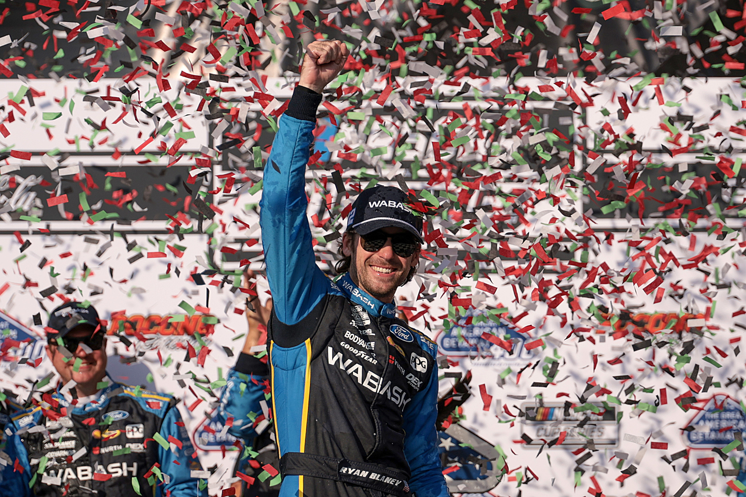 Ryan Blaney, driver of the #12 Wabash Ford, celebrates in...