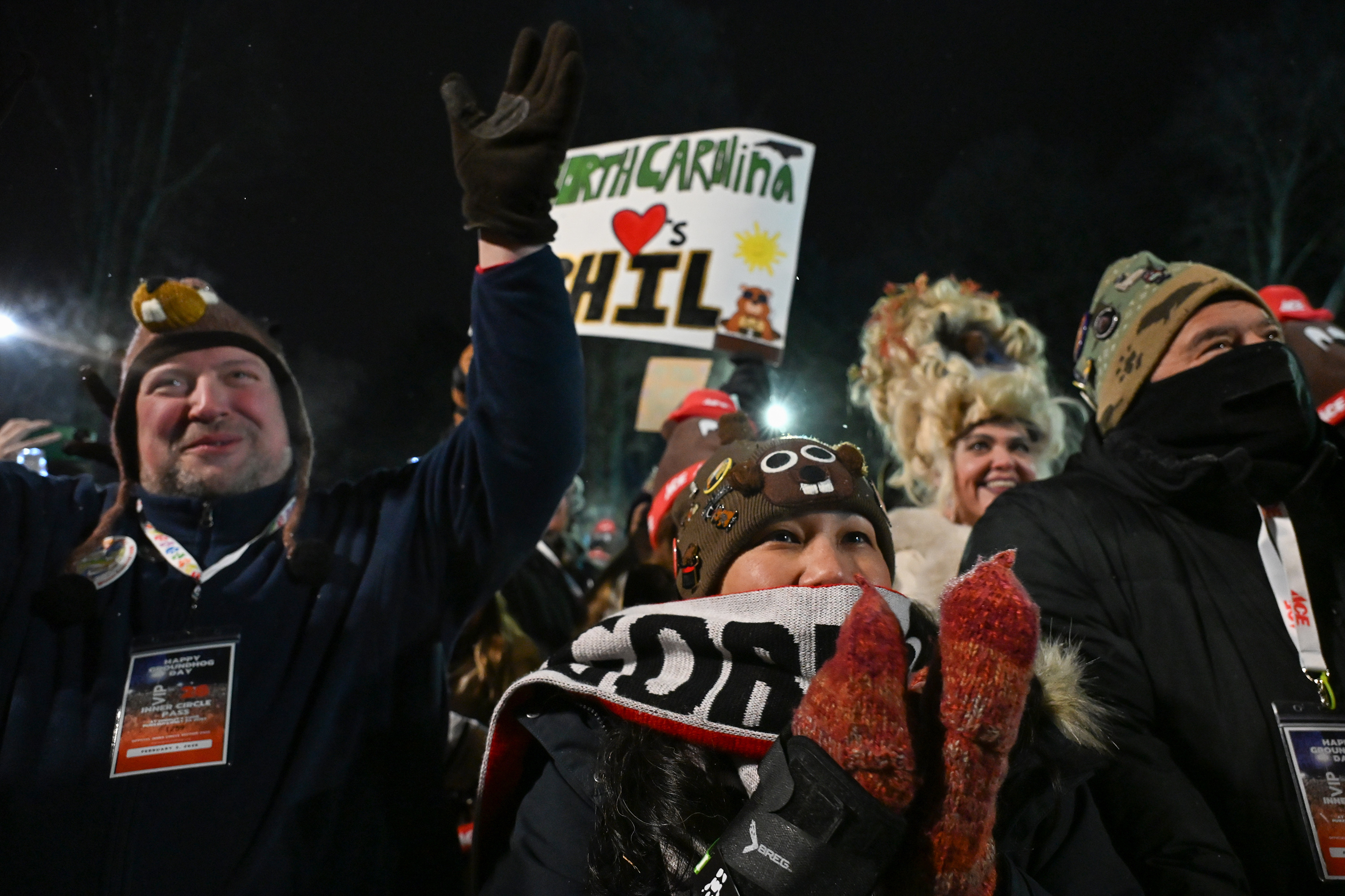 Cami Lutgens, of Blacksburg, Va., celebrates while waiting for Punxsutawney...