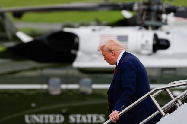 President Donald Trump disembarks Air Force One at Lehigh Valley International Airport, Friday, Aug. 1, 2025, in Allentown. (Julia Demaree Nikhinson/AP)