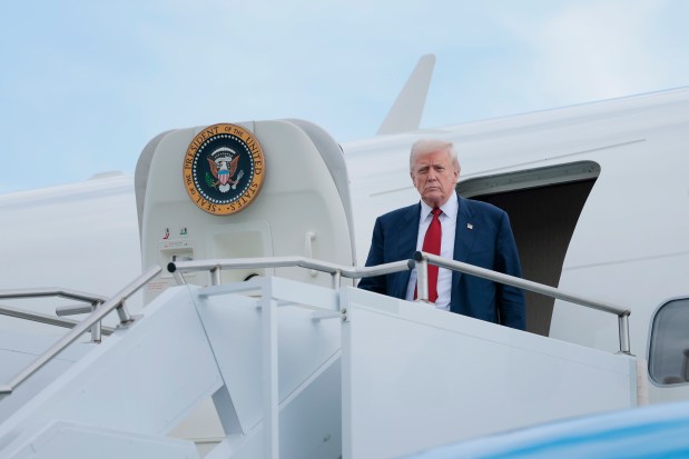President Donald Trump walks off Air Force One at Lehigh Valley International Airport on Friday, Aug. 1, 2025, near Allentown. Trump was headed to his Bedminster, New Jersey, golf course for the weekend. (Anna Moneymaker/Getty Images)
