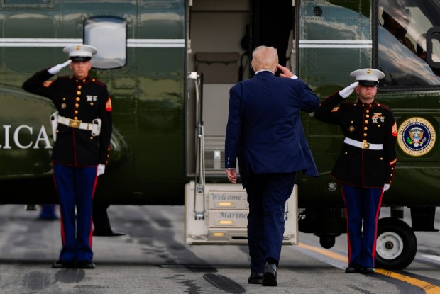 President Donald Trump salutes while boarding Marine One after arriving on Air Force One at Lehigh Valley International Airport, Friday, Aug. 1, 2025, near Allentown. (Julia Demaree Nikhinson/AP)