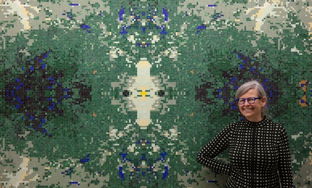 Artist Ava Blitz with her mosaic creation, "Seasons." (Photo by Doug Wechsler, courtesy Ava Blitz)