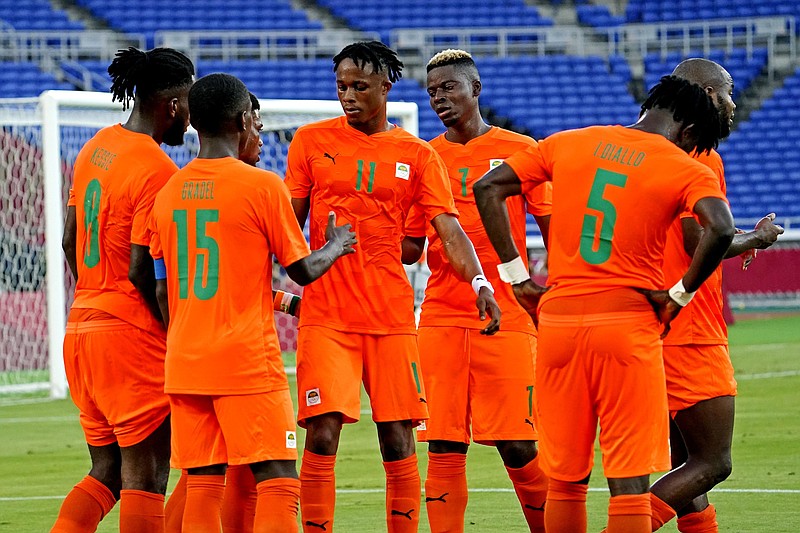 Players on Ivory Coast react after an own goal in a game during the Tokyo 2020 Olympics against Saudi Arabia at Nissan Stadium in Yokohama, Japan, on July 22, 2021.