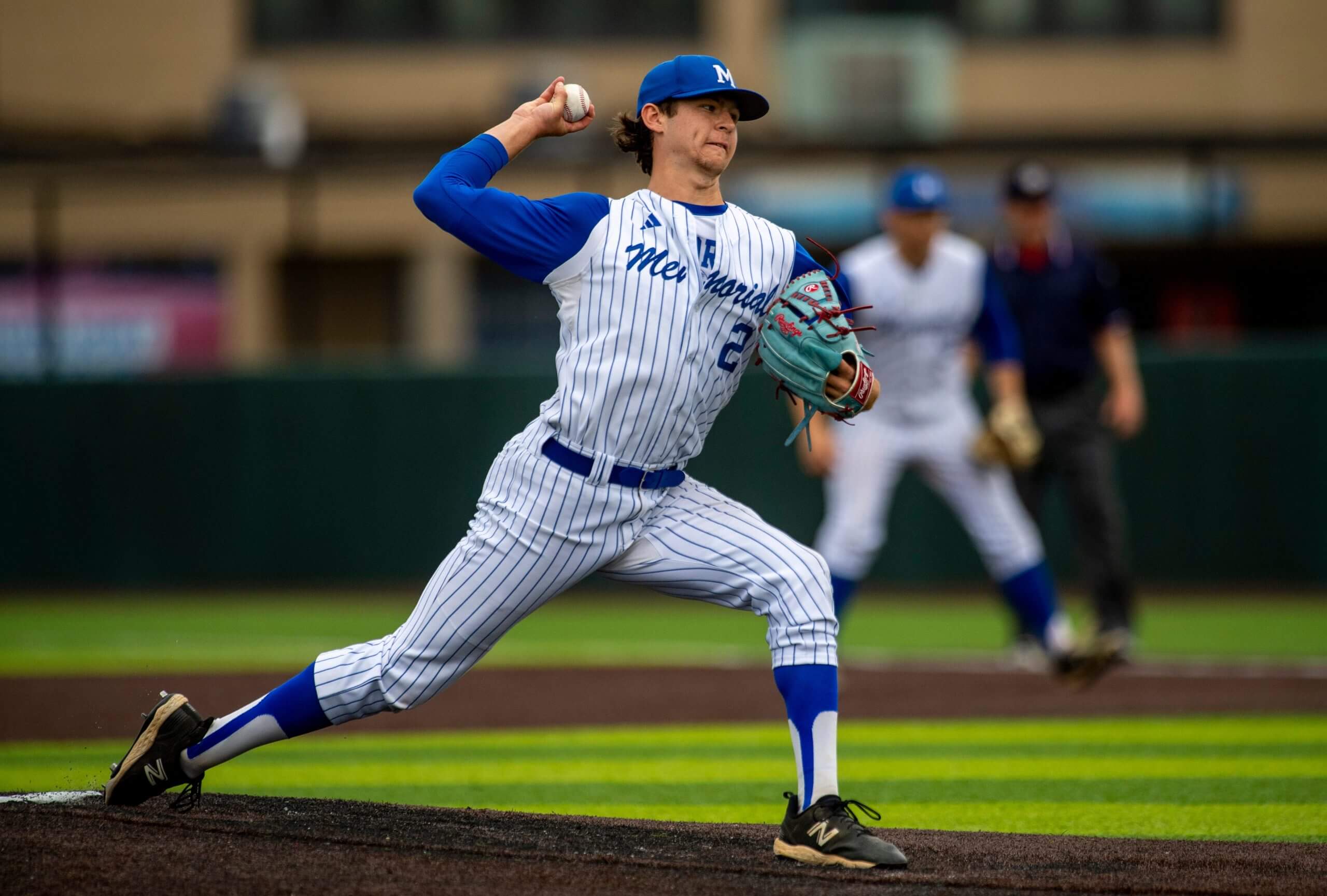 Memorial's Matthew Fisher (2) pitches as the Memorial Tigers play the Silver Creek Dragons in the 2024 IHSAA Baseball semistate at Braun Stadium in Evansville, Ind.