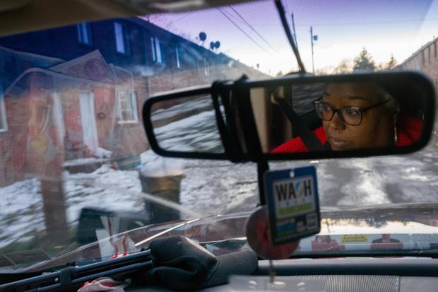 Dorcas Rumble, a community health worker, looks out at rows of deteriorating housing originally built for steelworkers in the 1940's, in Clairton, Pa., on Wednesday, Dec. 17, 2025. (Quinn Glabicki/Pittsburgh's Public Source via AP)