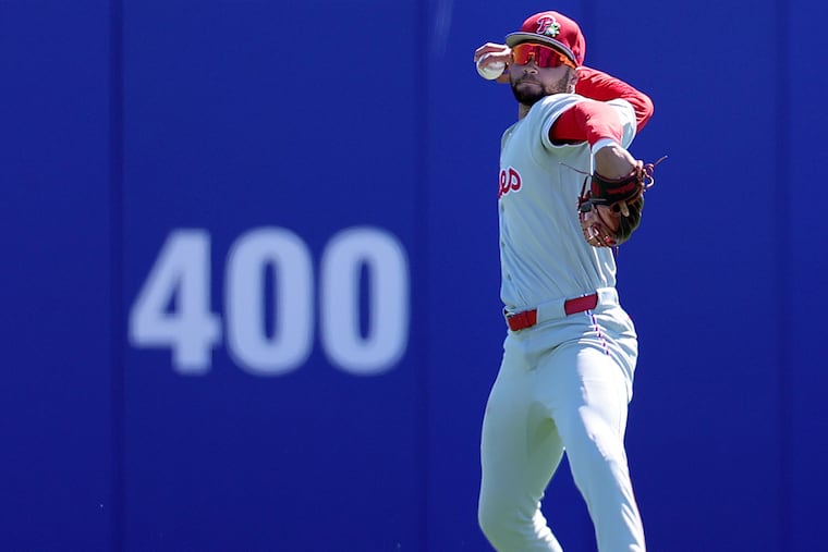 Phillies Justin Crawford fields a ball in center field against the Toronto Blue Jays in Saturday's spring training game in Dunedin, Fla