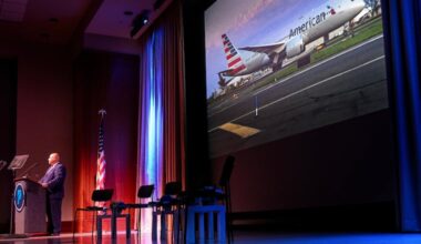 Atif Saeed, CEO of Philadelphia's Department of Aviation, speaks during a news conference last September. Saeed is stepping down from the role later this month.