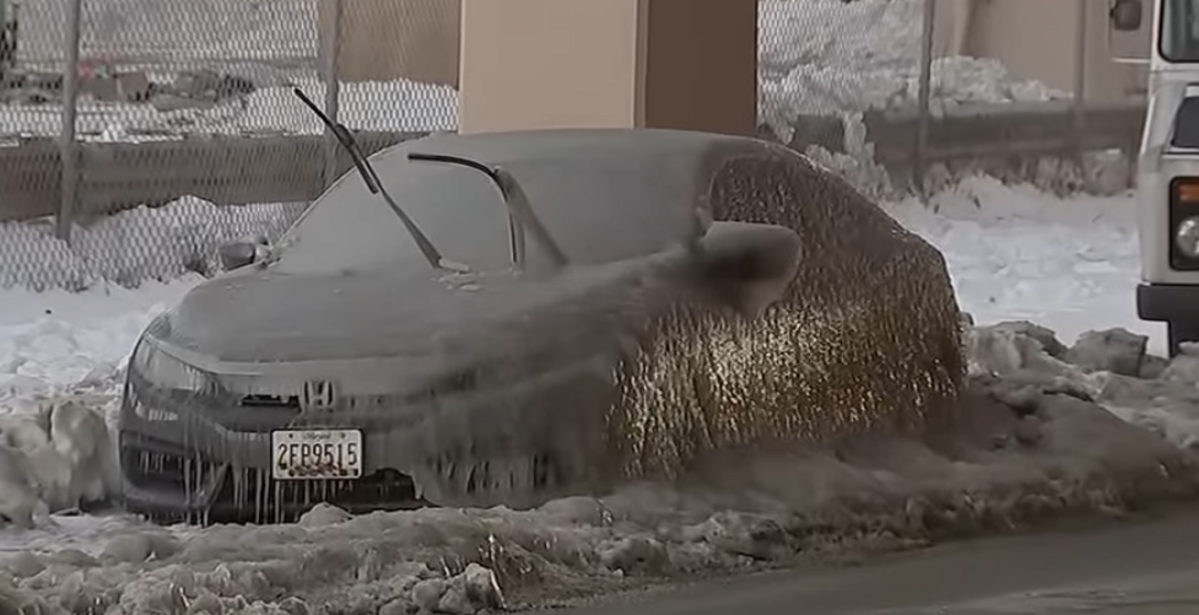 Car Covered In Ice After A Pipe Bursted Nearby In Philadelphia