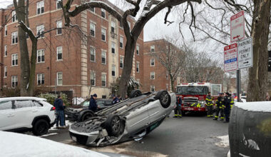 Car flips over at intersection of Magazine and Erie