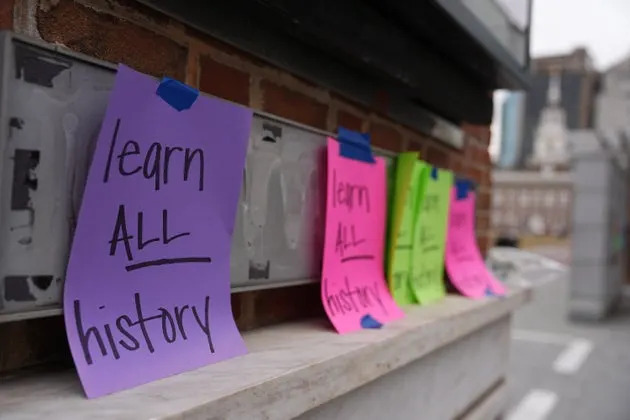 Signs hang last month on the locations of the now-removed explanatory panels that were part of an exhibit on slavery at the President's House Site in Philadelphia.