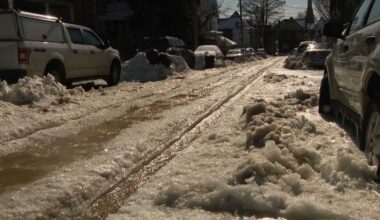Ice piles up on Farragut Street in Pittsburgh’s Highland Park after water main break