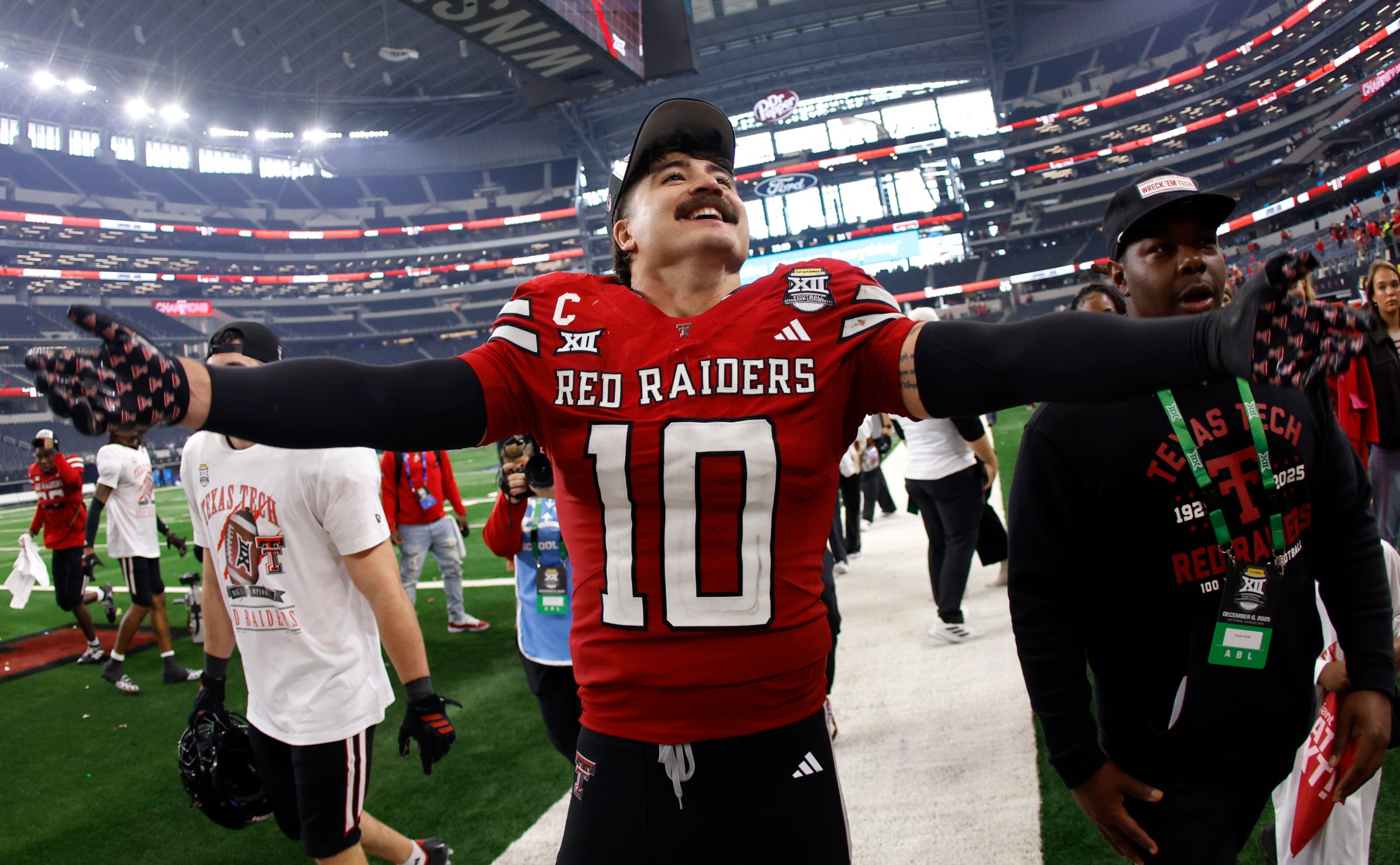 ARLINGTON, TEXAS - DECEMBER 6: Jacob Rodriguez #10 of the Texas Tech Red Raiders celebrates following the team’s win over the BYU Cougars for the Big 12 Championship at AT&T Stadium on December 6, 2025 in Arlington, Texas. (Photo by Ron Jenkins/Getty Images)
